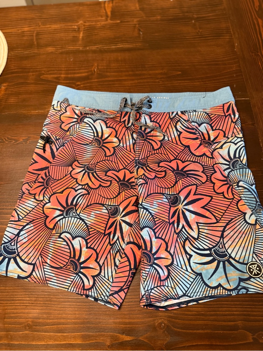 Roark Men’s Floral Swim Trunks in Coral, Blue, Black